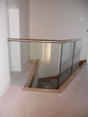 Glass and stainless steel landing